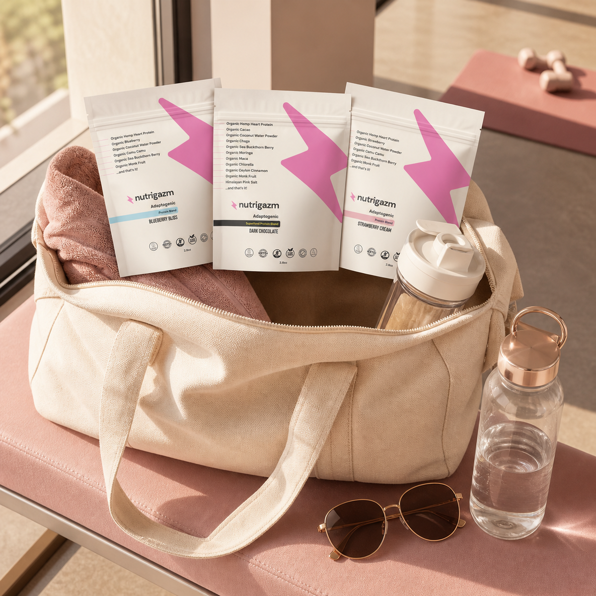 Three Nutrigazm travel pouches packed in a gym bag